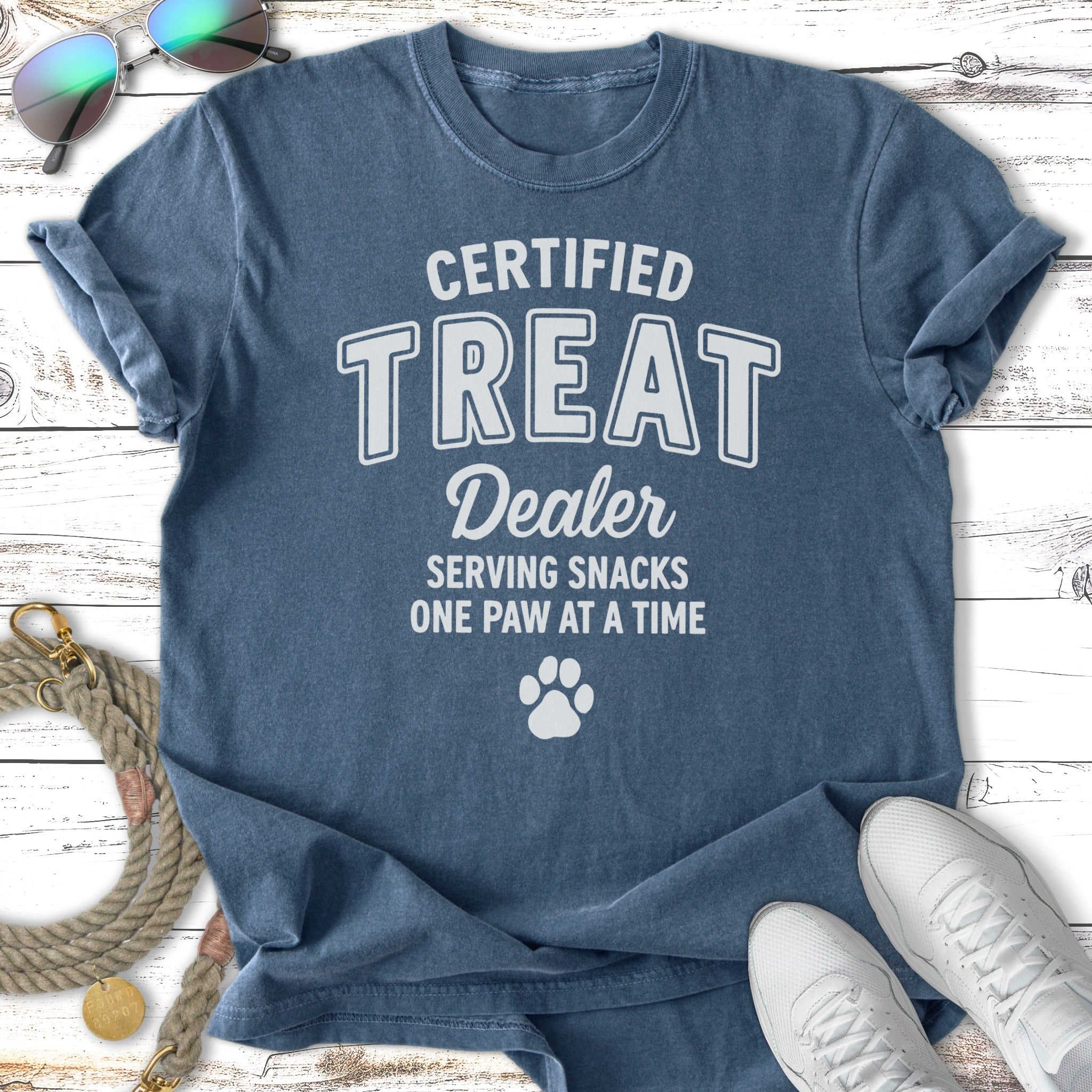 Blue t-shirt with "Certified Treat Dealer" and paw print.