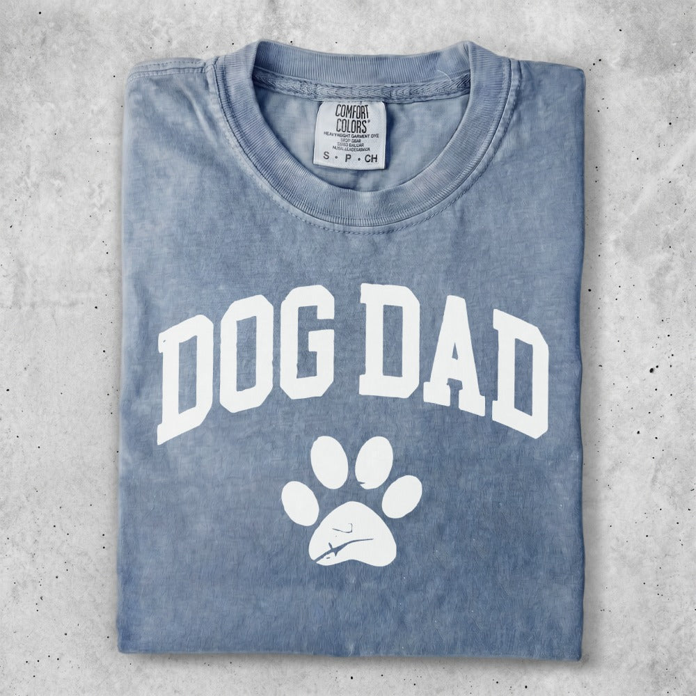 Comfort Colors grey t-shirt with "DOG DAD" and a paw print.