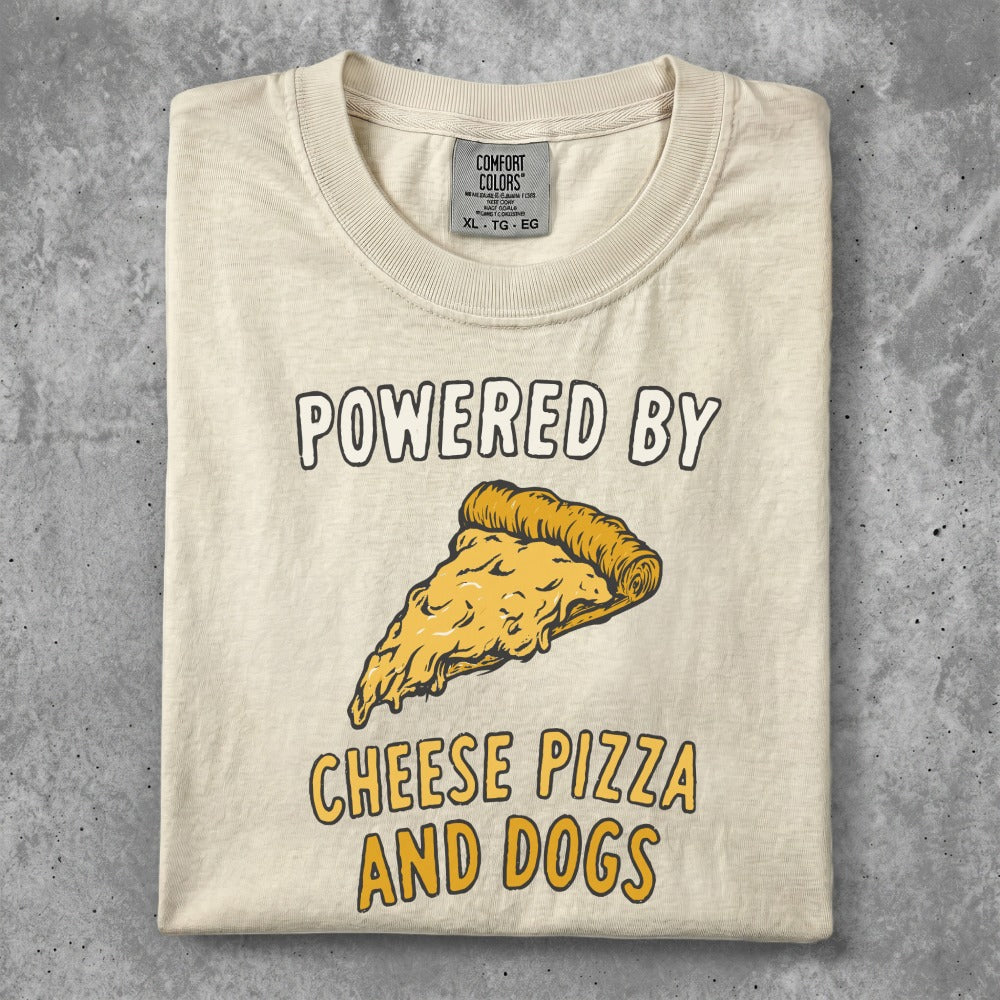 Cream t-shirt with "POWERED BY CHEESE PIZZA AND DOGS" and pizza slice graphic.