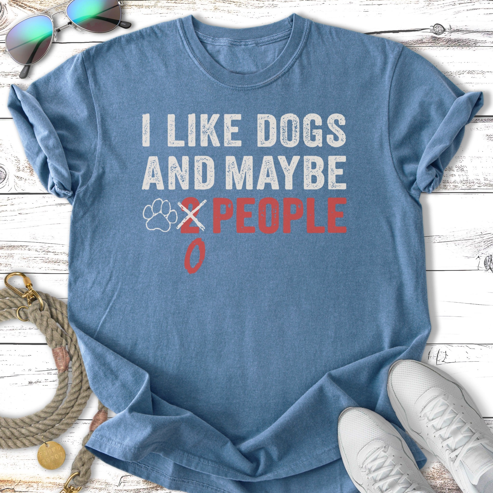 Blue t-shirt with "I Like Dogs and Maybe 2 People" text.