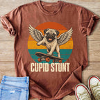 Pug with wings skateboarding with text "CUPID STUNT"