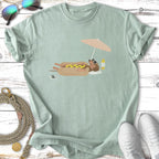 Dachshund in a hot dog bun relaxing on a beach under a pastel umbrella.