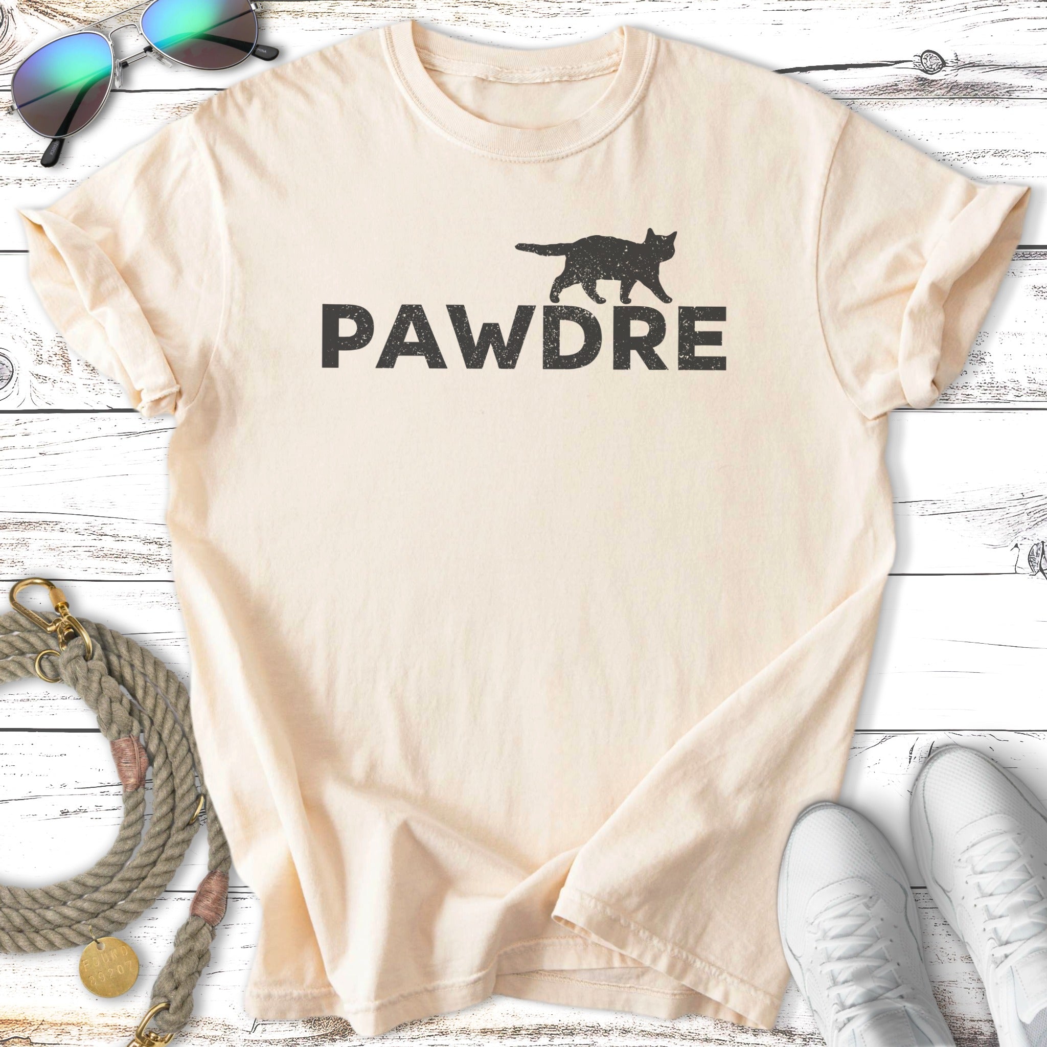 Cream t-shirt with black "PAWDRE" text and a cat silhouette.