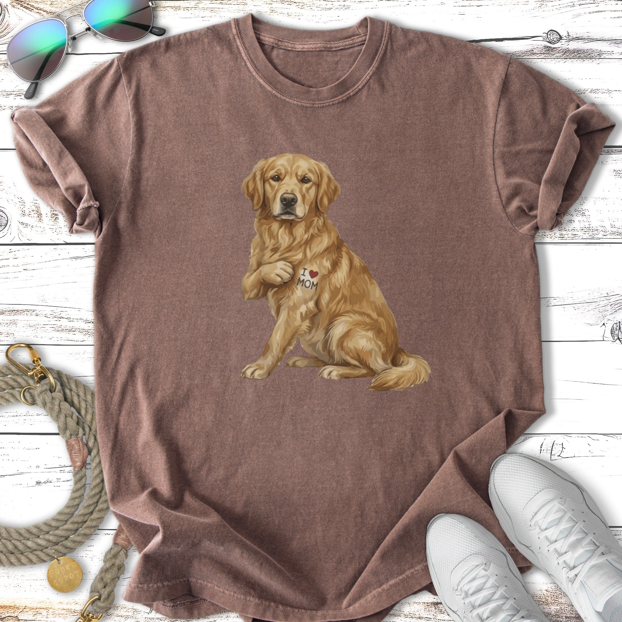 Golden retriever with "I ❤️ MOM" tattoo on t-shirt.