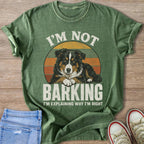 Green t-shirt with a dog illustration and text "I'M NOT BARKING, I'M EXPLAINING WHY I'M RIGHT".