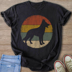 Dark t-shirt with silhouette of a German Shepherd within a vintage striped circle.