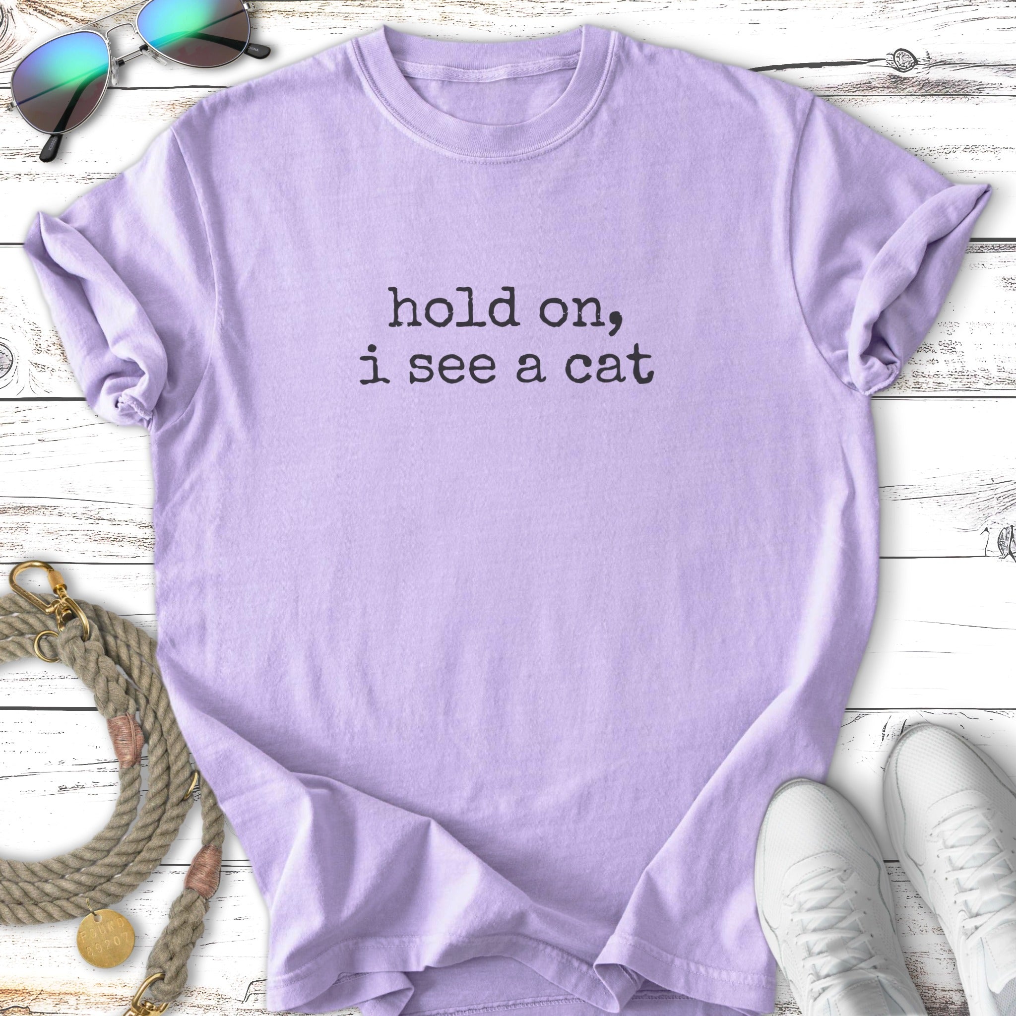 Light purple t-shirt with "Hold on, I see a cat" text.