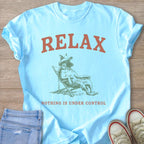 Light blue t-shirt with "RELAX" above a dog wearing a hat sitting in a chair.