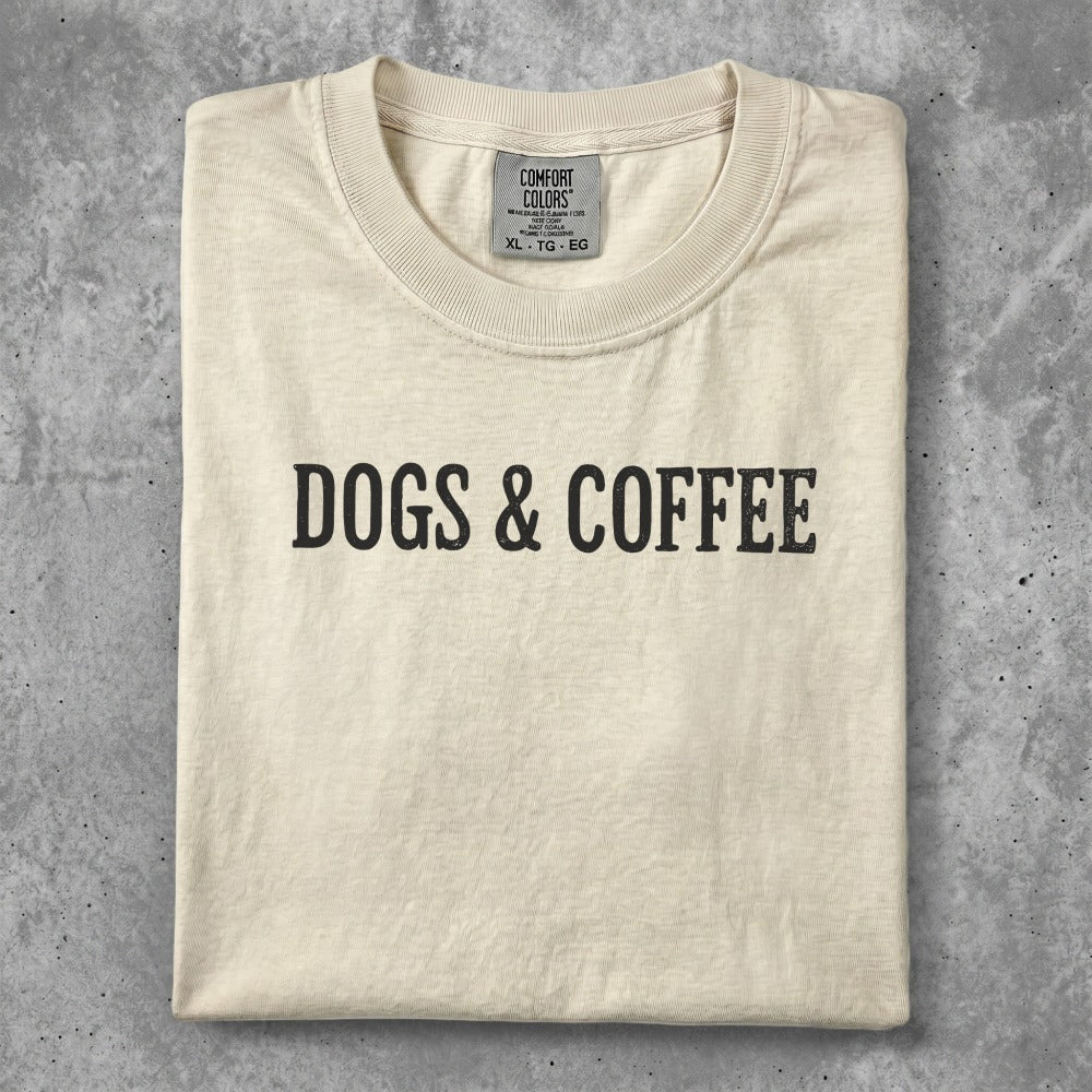 Cream t-shirt with "DOGS & COFFEE" text in black.