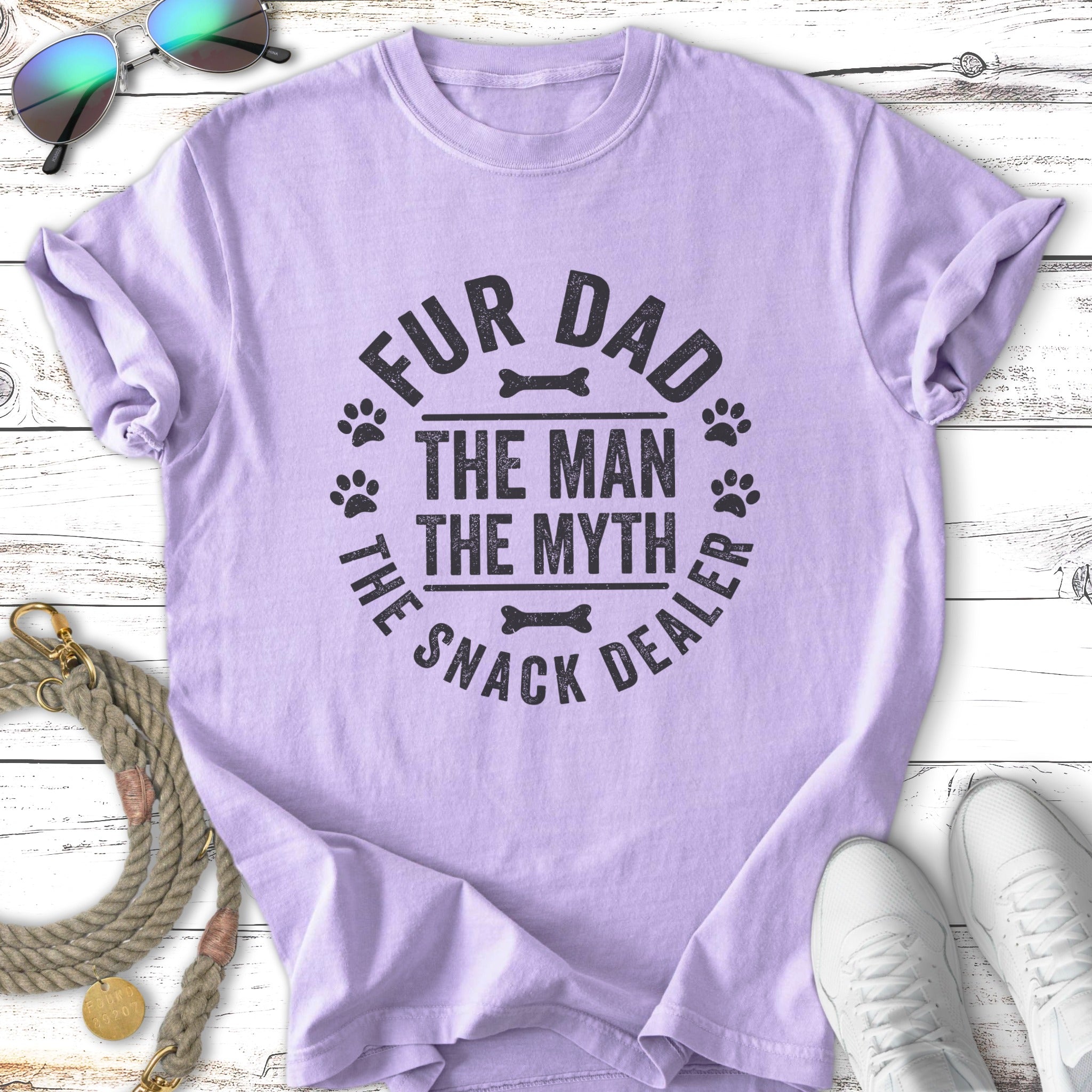 Purple t-shirt with "Fur Dad The Man The Myth The Snack Dealer" text and paw prints.