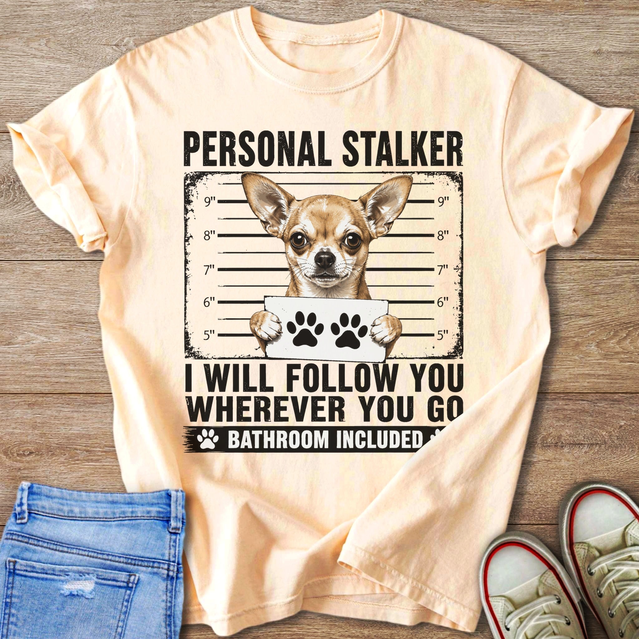 Light peach t-shirt with Chihuahua mugshot graphic: "Personal Stalker" and "I will follow you wherever you go".