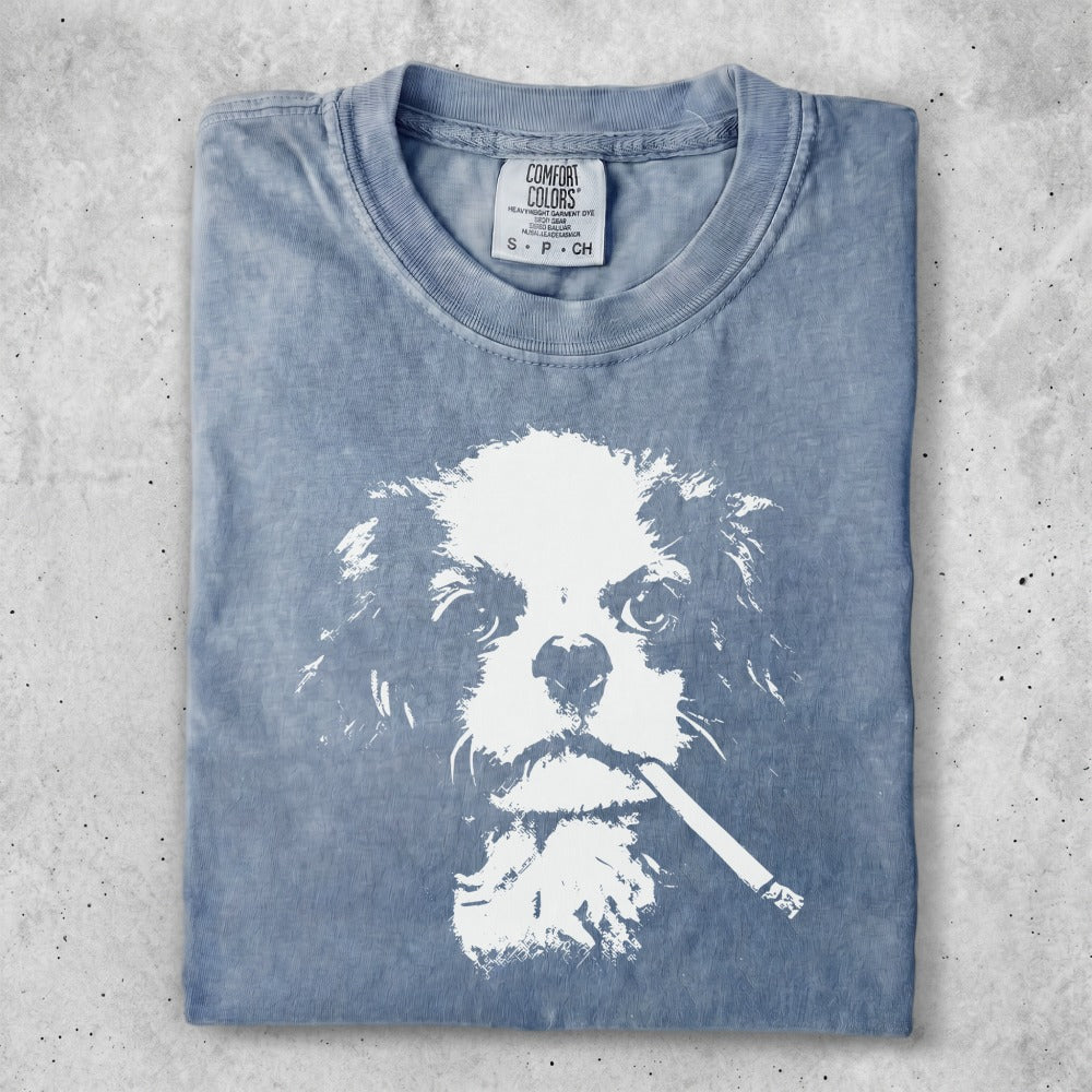 Blue t-shirt with a white graphic of a dog smoking a cigarette.