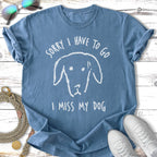Blue t-shirt with white text and a dog drawing: "Sorry I Have to Go I Miss My Dog".