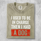T-shirt with "I used to be in charge then I had a dog" text.
