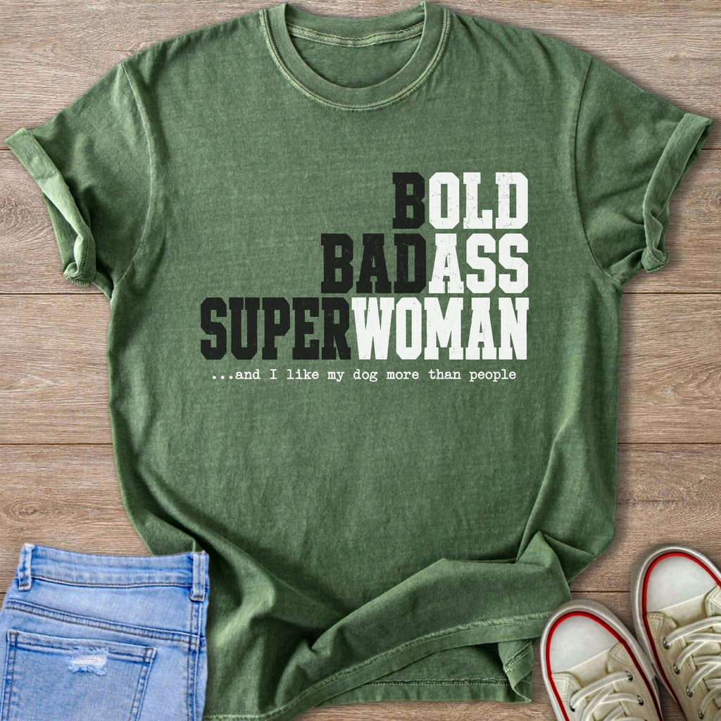 Green t-shirt with bold text: "BOLD BADASS SUPERWOMAN ...and I like my dog more than people."