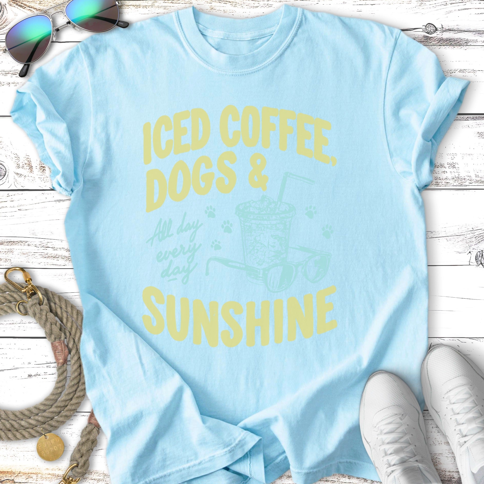 Light blue t-shirt with "Iced Coffee, Dogs & Sunshine" text and graphic.