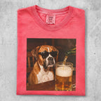 Boxer dog wearing sunglasses sits at table with a beer.