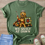 Golden retriever wearing a knight's helmet, holding a seam ripper and quilt.