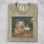 Golden retriever dog wearing a blue cap pours beer into a mug.