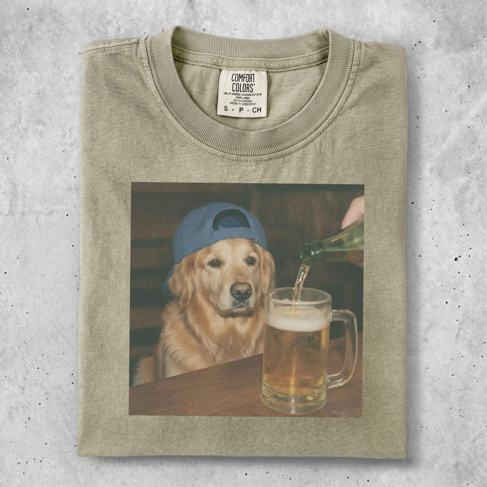 Golden retriever dog wearing a blue cap pours beer into a mug.