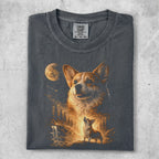 Corgi dog with moon and waterfall, printed on a charcoal grey t-shirt.