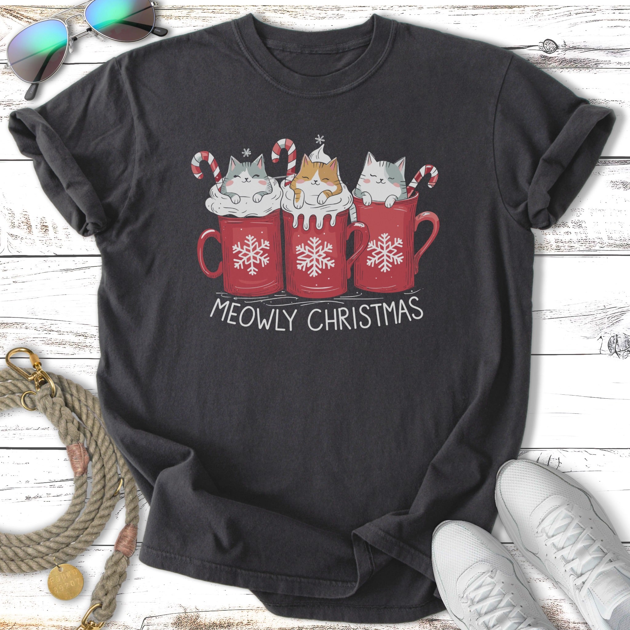 Three cats in mugs with "Meowly Christmas" text.