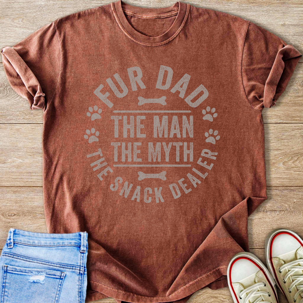 T-shirt with "FUR DAD THE MAN THE MYTH THE SNACK DEALER" text and paw prints.