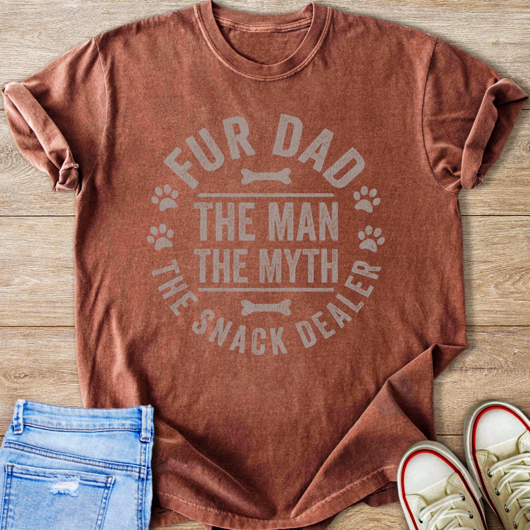 T-shirt with "FUR DAD THE MAN THE MYTH THE SNACK DEALER" text and paw prints.