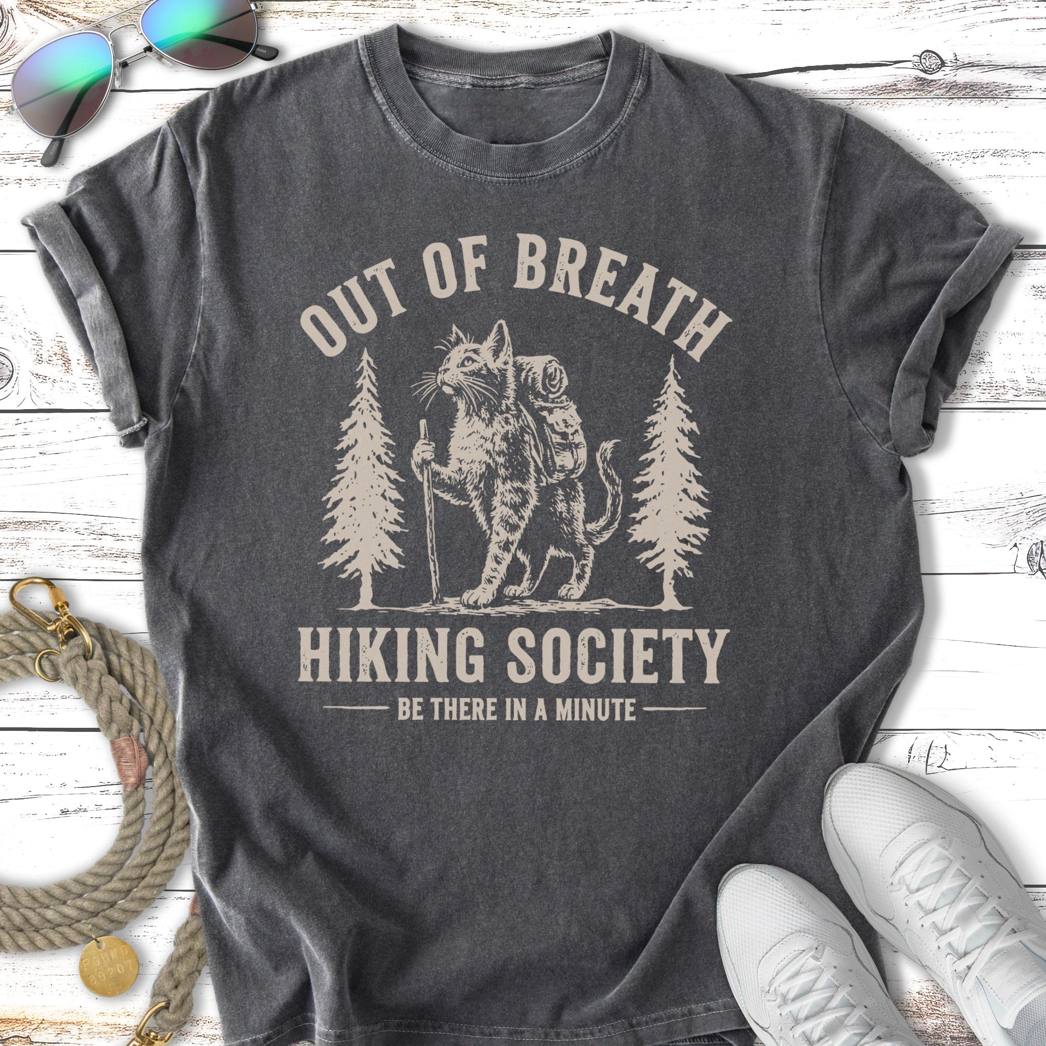 T-shirt with a cat hiking, "OUT OF BREATH HIKING SOCIETY" text.