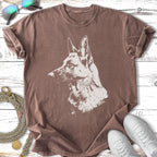 T-shirt with a German Shepherd head sketch on a brown background.