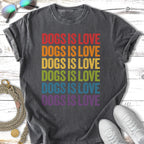 T-shirt with rainbow text that reads "Dogs is Love" stacked vertically.
