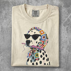 Cream t-shirt with a dalmatian wearing sunglasses and a crochet scarf.