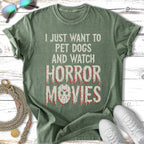 Green t-shirt with text "I just want to pet dogs and watch horror movies" and a graphic.