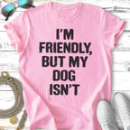 Pink t-shirt with "I'm Friendly, But My Dog Isn't" text.