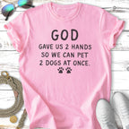 Pink t-shirt with "God gave us 2 hands so we can pet 2 dogs at once" text.