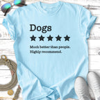 Light blue t-shirt with "Dogs. Much better than people. Highly recommend." and five stars.