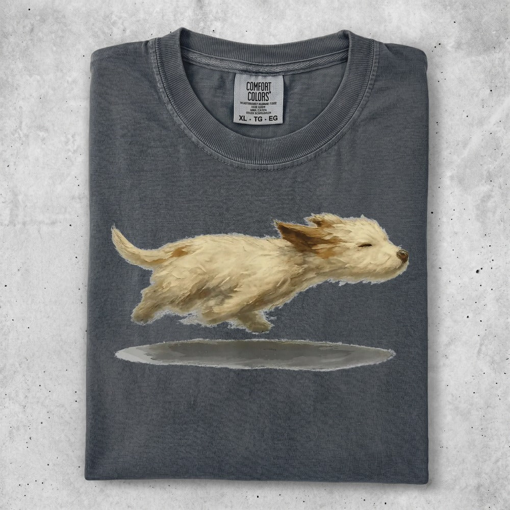 T-shirt with painted golden dog running, Comfort Colors logo at neck.