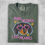 Dachshund wearing heart sunglasses with text "More Weenies Less Meanies".