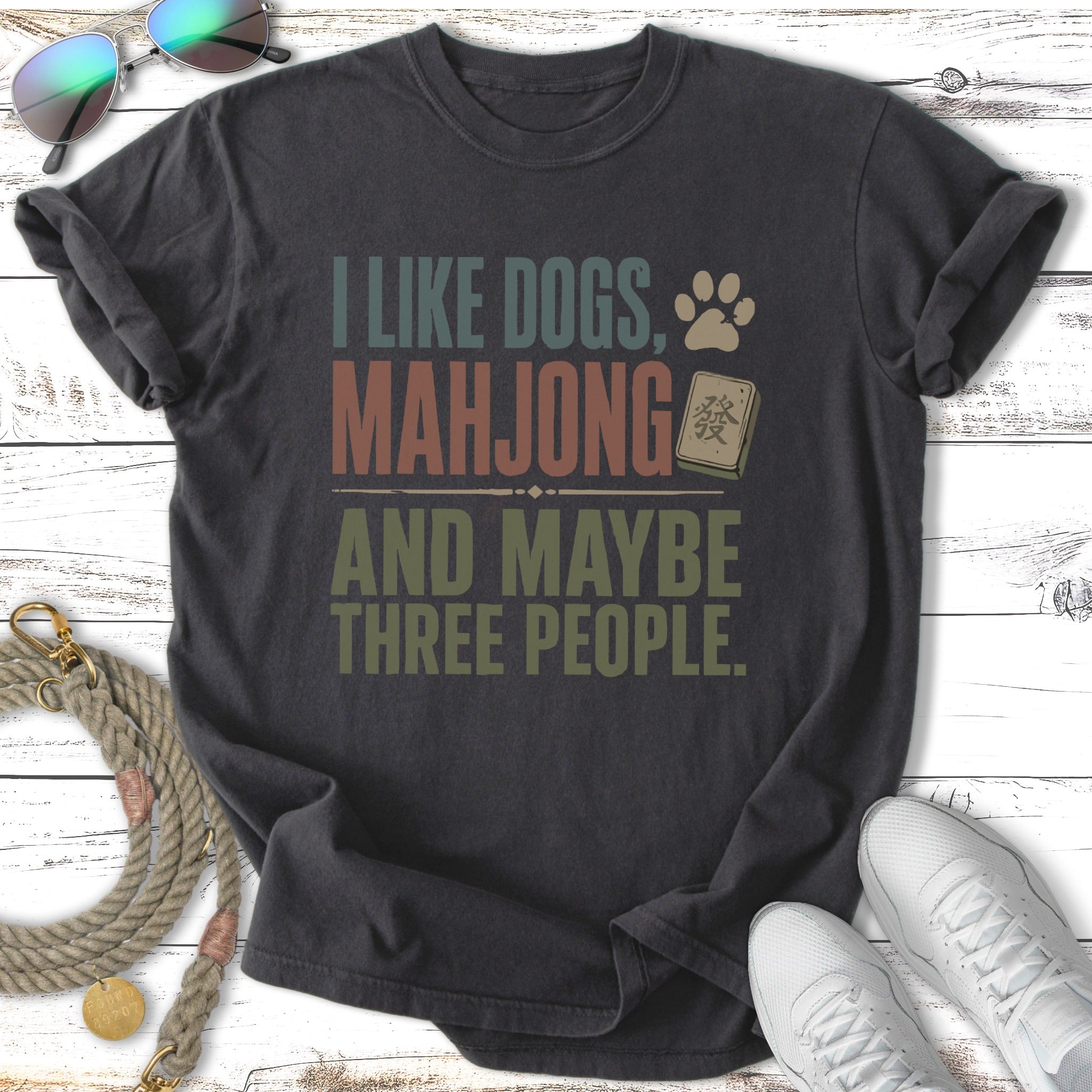 T-shirt with text "I like dogs, mahjong, and maybe three people."