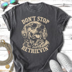 Black t-shirt with distressed golden retriever wearing sunglasses and text "Don't Stop Retrieving".