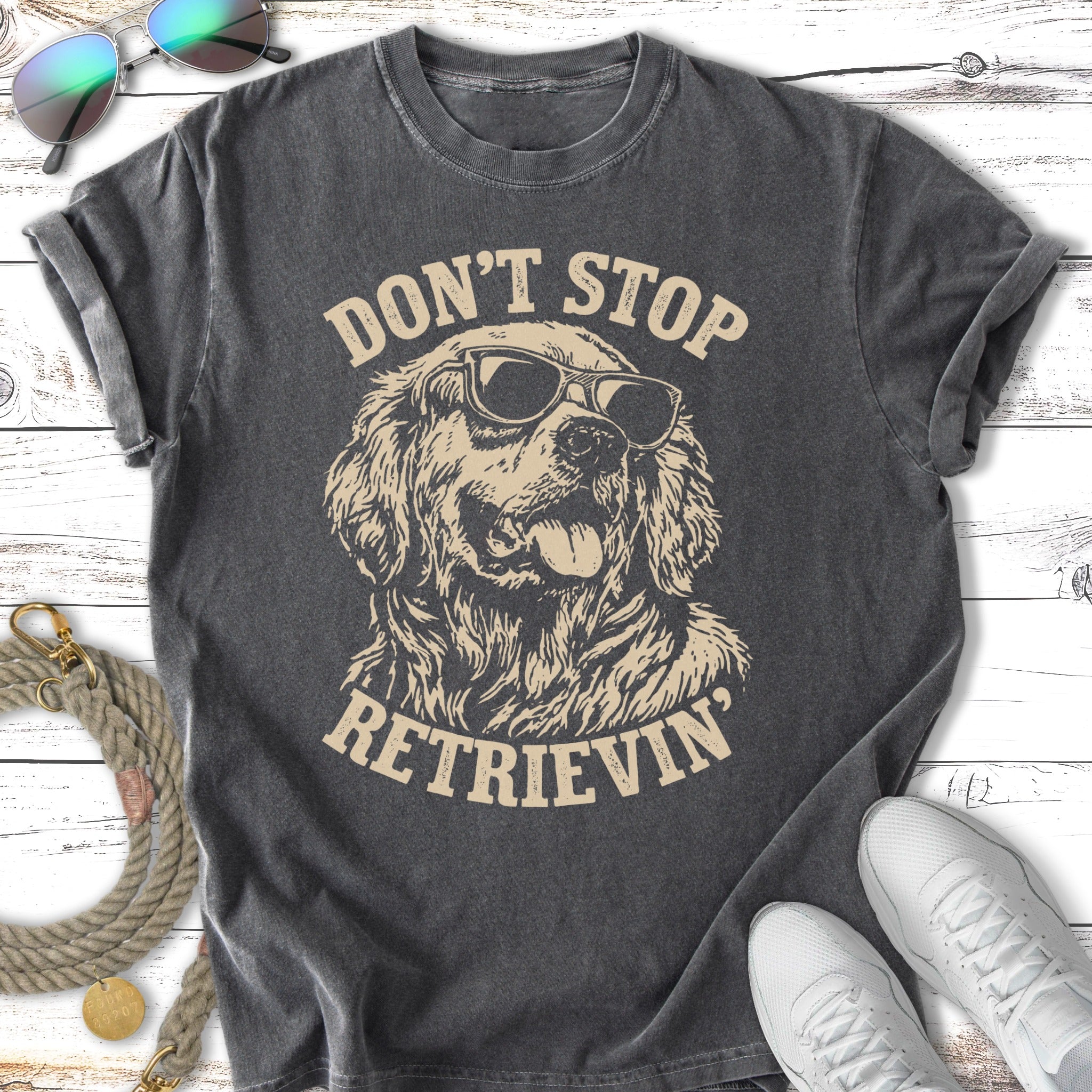 Black t-shirt with distressed golden retriever wearing sunglasses and text "Don't Stop Retrieving".