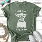 Green t-shirt with a distressed graphic of a snarling dog and text "i got that dog in me".