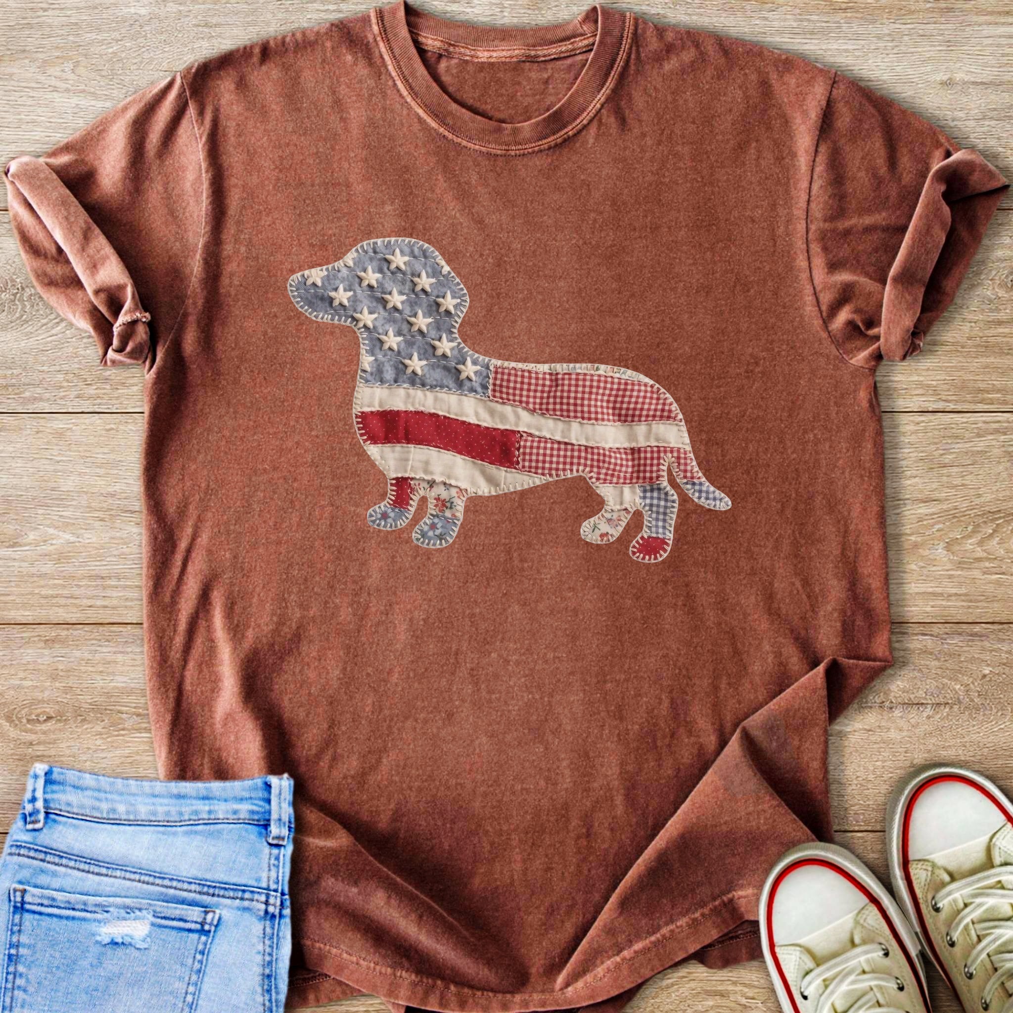 Brown t-shirt with a dachshund outline in patriotic patchwork fabric.