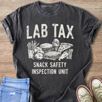 T-shirt with "Lab Tax Snack Safety Inspection Unit" text and various snacks.