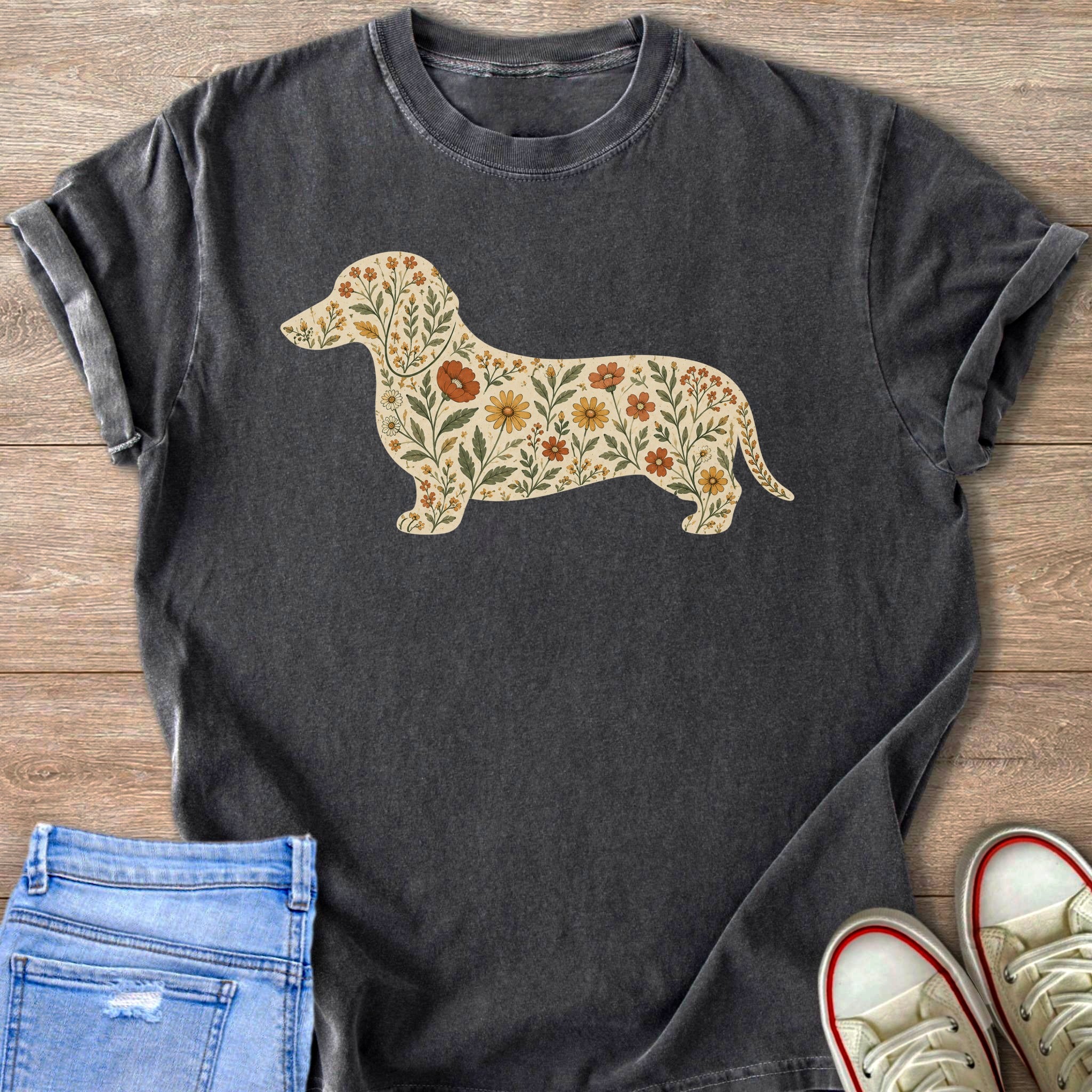 Dark grey t-shirt with a floral dachshund graphic on a cream background.