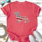 Red t-shirt with patriotic dachshund design and white sneakers.