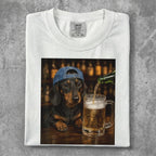 Dachshund wearing a baseball cap, with beer being poured into a mug.