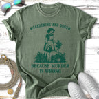Green t-shirt with "Gardening and Dogs Because Murder Is Wrong" text and graphic.