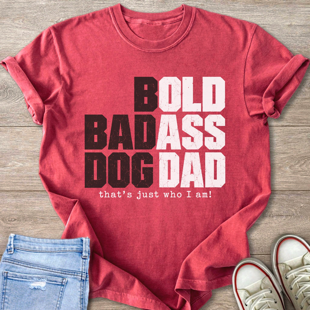 Crimson t-shirt with "BOLD BADASS DOG DAD that's just who I am!" text.