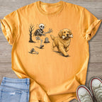 Golden Retriever carries bone past skeleton running from tombstone.